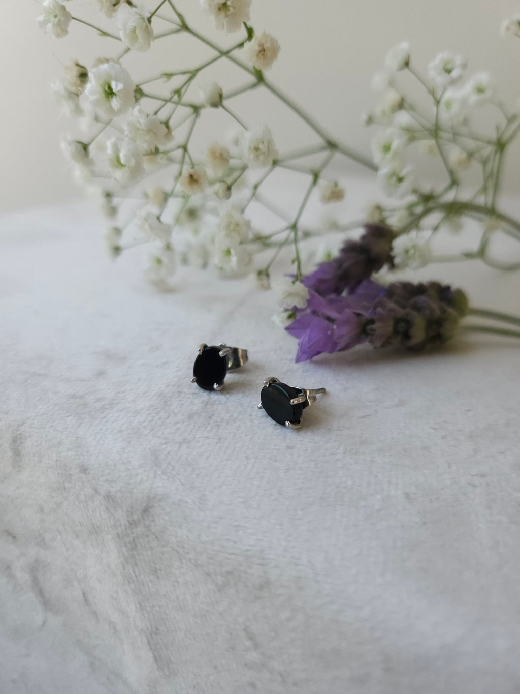 Aretes Onix cubierta en Rodio