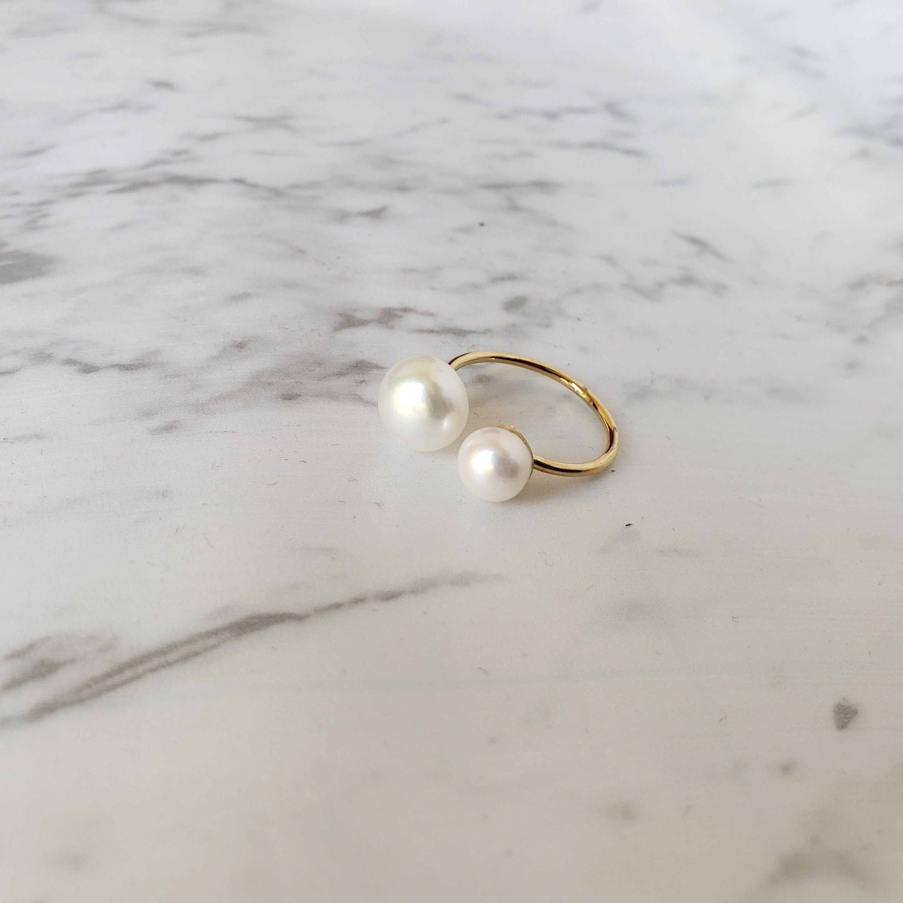 Anillo Doble Perla con cubierta en Oro