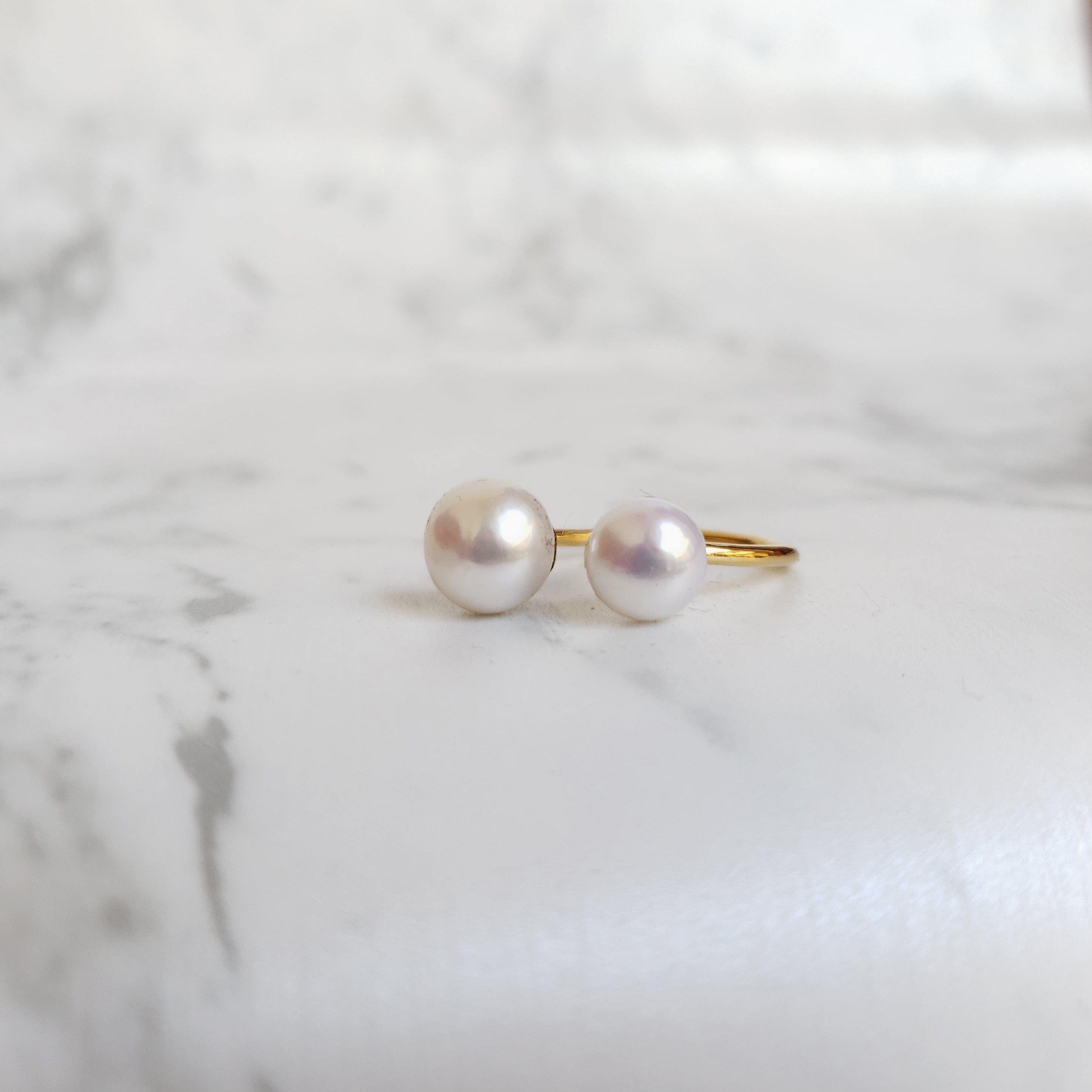 Anillo Doble Perla con cubierta en Oro