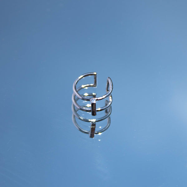 Caracola doble en plata con columna en medio