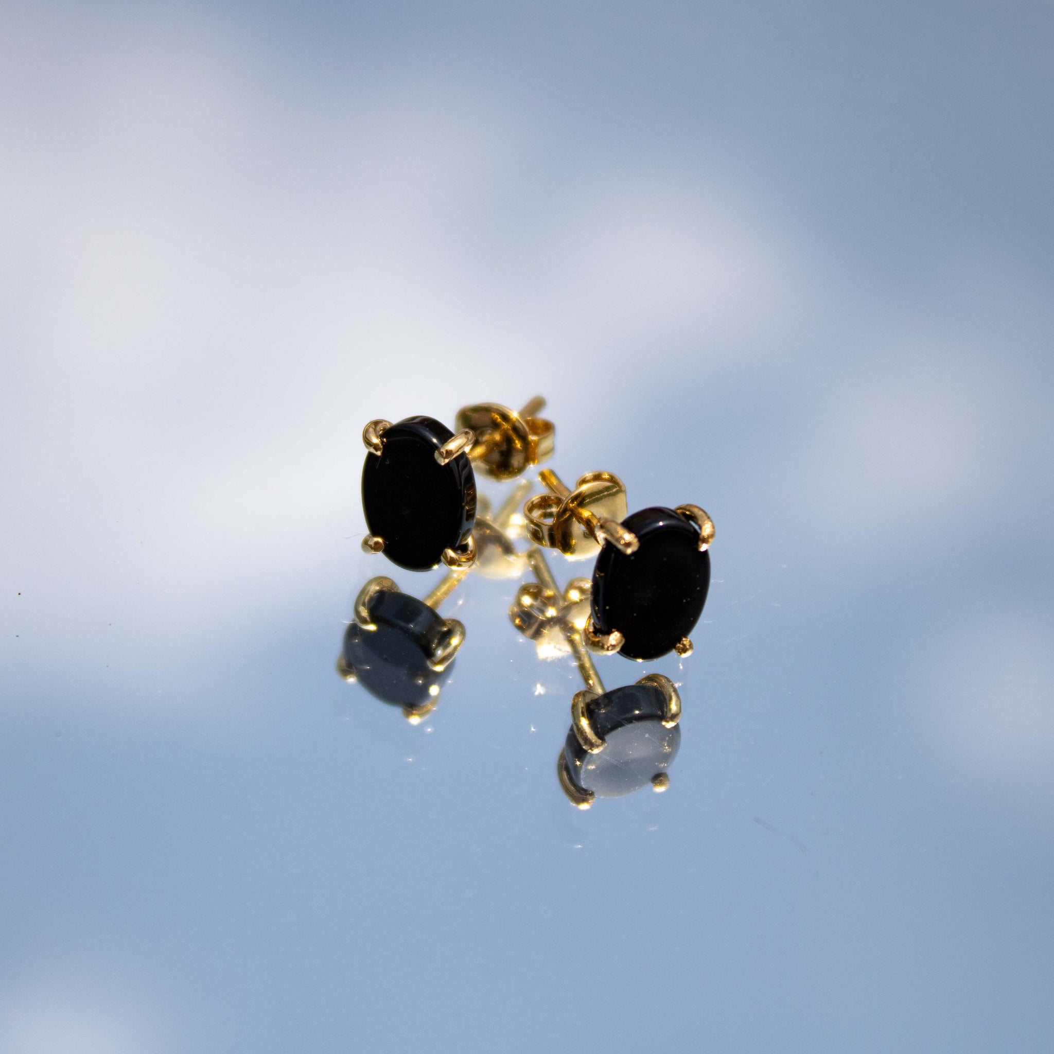 Aretes Onix Cubierta de Oro